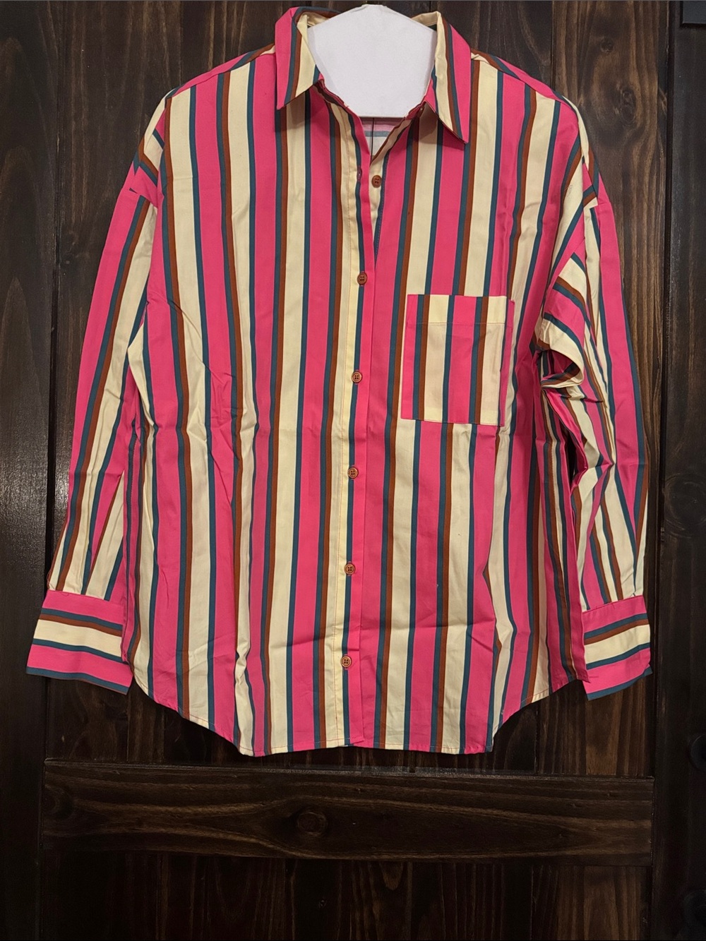 Poplin Shirt
Pink combo striped button down. - Picture 3 of 5